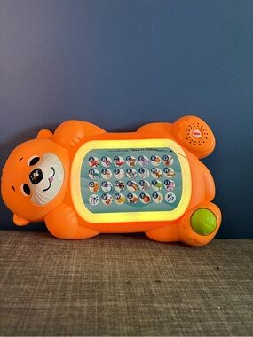 Fisher-Price Orange Limimal otter, interactive alphabet learning toy